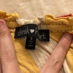 Barely worn. Very comfortable. Style as a crop top!